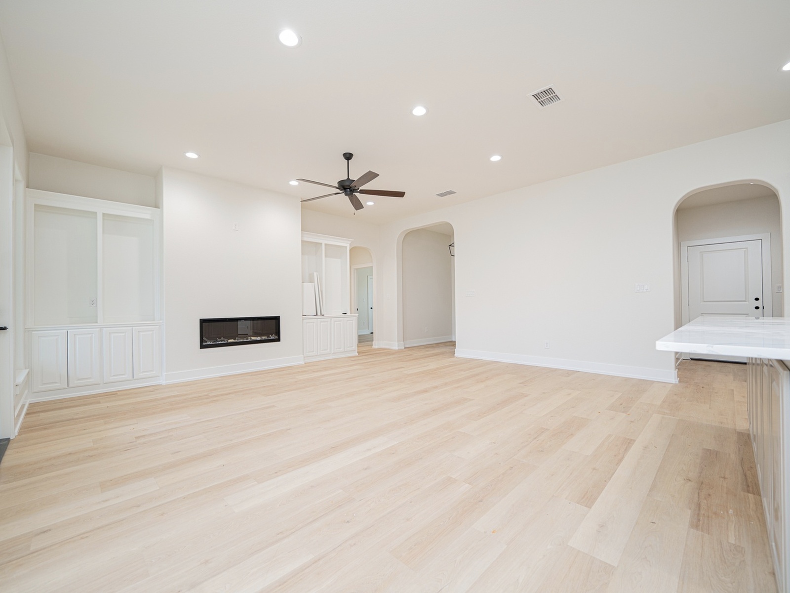 longview-custom-home-builder-modern-open-living-space-with-fireplace